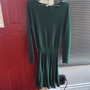 Green pleated skirt dress.